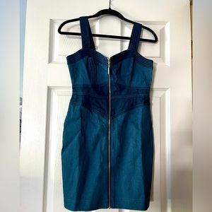 Betsey Johnson sleeveless denim dress with corset and zipper details.